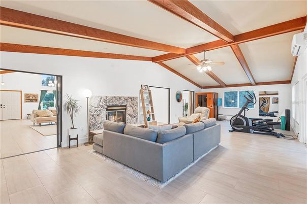 Fireplace, Fitness Equipment, Interior, Living room, Wooden Beams, Wood Texture Flooring