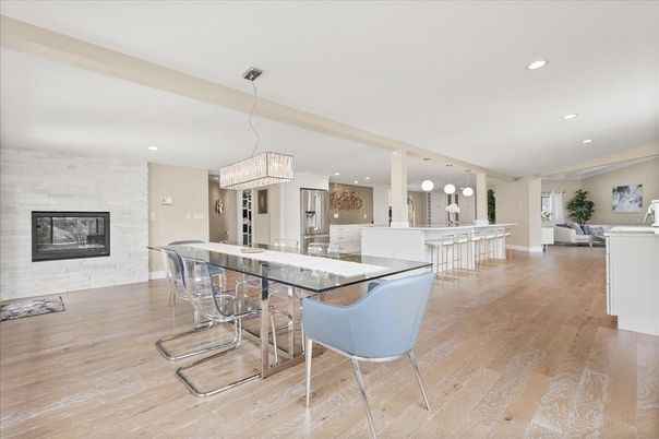 Chandelier, Dining room, Interior, Kitchen, Living room, Pendant Lights, Recessed Lighting, Stone Walls, Wood Texture Flooring