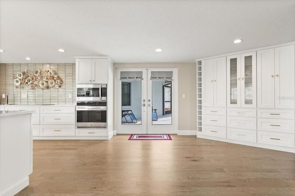 Interior, Kitchen, Recessed Lighting, Stainless Steel Appliances, Wood Texture Flooring