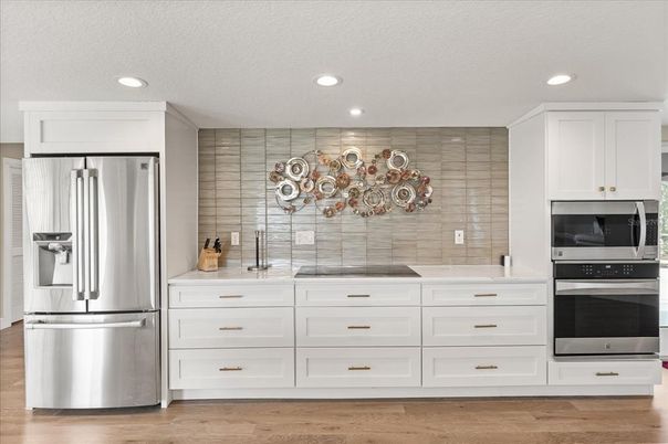 Interior, Kitchen, Recessed Lighting, Stainless Steel Appliances, Wood Texture Flooring
