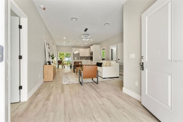 Dining room, Interior, Kitchen, Living room, Pendant Lights, Recessed Lighting, Wood Texture Flooring