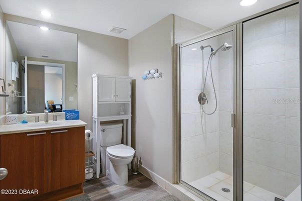 Bathroom, Glass Shower, Interior, Recessed Lighting, Wood Texture Flooring