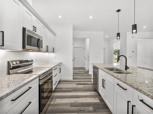 Interior, Kitchen, Pendant Lights, Recessed Lighting, Stainless Steel Appliances, Wood Texture Flooring