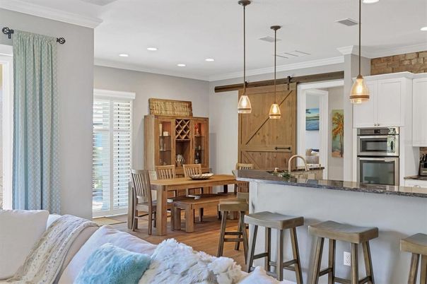 Dining room, Interior, Kitchen, Pendant Lights, Recessed Lighting, Stainless Steel Appliances, Wood Texture Flooring