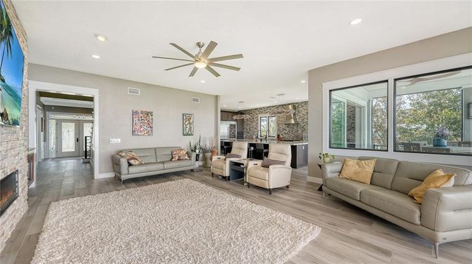 Fireplace, Interior, Kitchen, Living room, Pendant Lights, Recessed Lighting, Stone Walls, Wood Texture Flooring