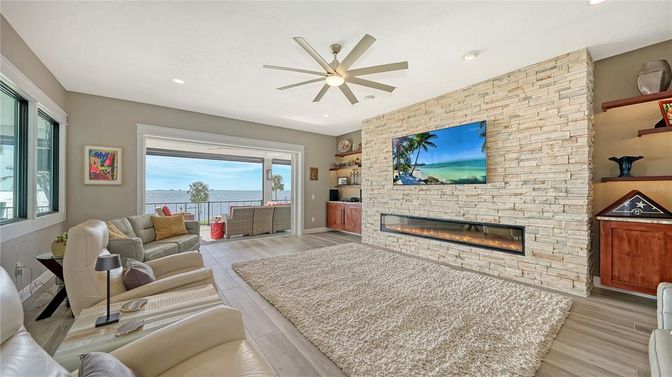 Fireplace, Interior, Living room, Recessed Lighting, Stone Walls, Wood Texture Flooring
