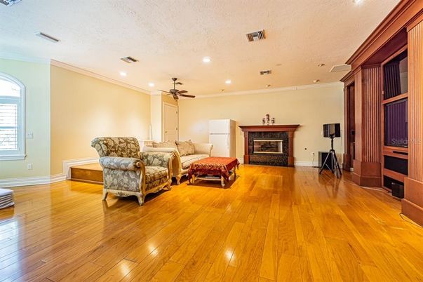 Fireplace, Interior, Living room, Recessed Lighting, Wood Texture Flooring