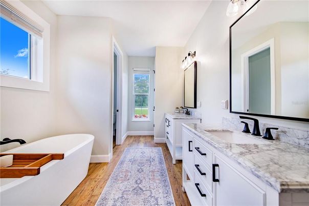 Bathroom, Dual Sink Vanities, Free Standing Baths, Interior, Wood Texture Flooring