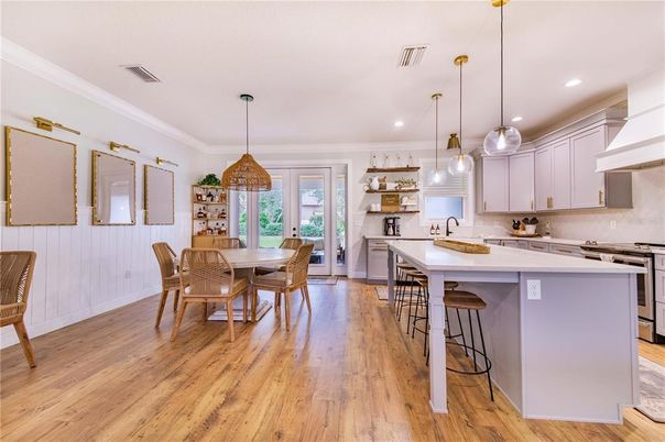 Dining room, Interior, Kitchen, Pendant Lights, Recessed Lighting, Stainless Steel Appliances, Wood Texture Flooring