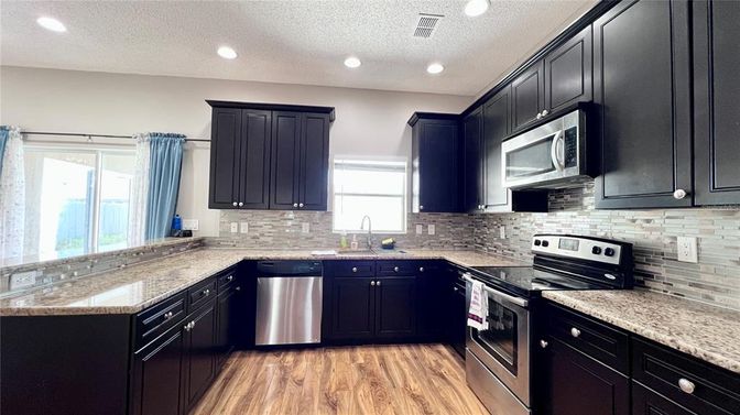 Interior, Kitchen, Recessed Lighting, Stainless Steel Appliances, Wood Texture Flooring