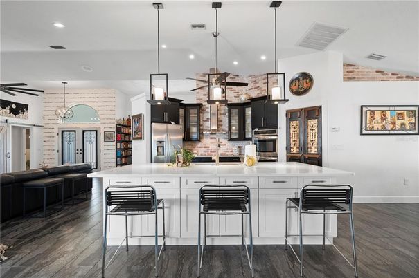 Interior, Kitchen, Pendant Lights, Recessed Lighting, Stainless Steel Appliances, Stone Walls, Wood Texture Flooring
