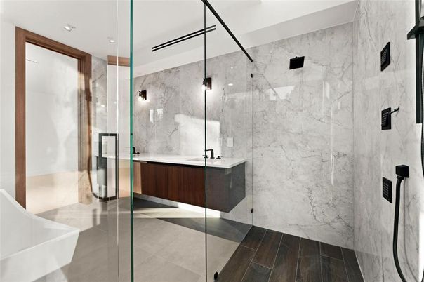 Bathroom, Glass Shower, Interior, Marble Walls, Recessed Lighting, Wood Texture Flooring