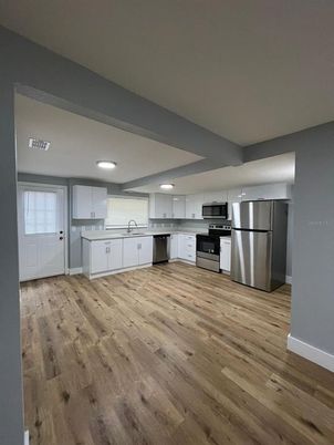 Interior, Kitchen, Recessed Lighting, Stainless Steel Appliances, Wood Texture Flooring
