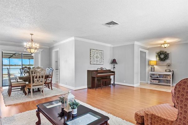 Chandelier, Dining room, Interior, Living room, Piano, Wood Texture Flooring