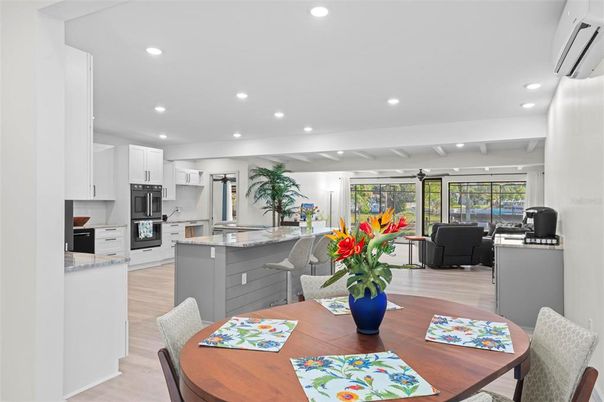 Dining room, Interior, Kitchen, Living room, Recessed Lighting, Stainless Steel Appliances, Wood Texture Flooring