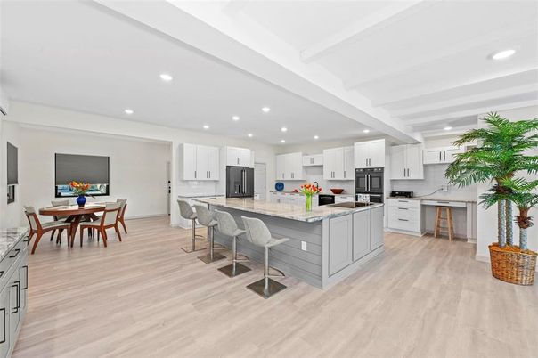 Dining room, Interior, Kitchen, Recessed Lighting, Stainless Steel Appliances, Wood Texture Flooring