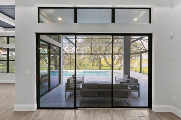 Interior, Pool, Recessed Lighting, Sun Room, Wood Texture Flooring