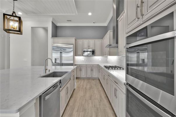 Interior, Kitchen, Pendant Lights, Recessed Lighting, Stainless Steel Appliances, Wood Texture Flooring