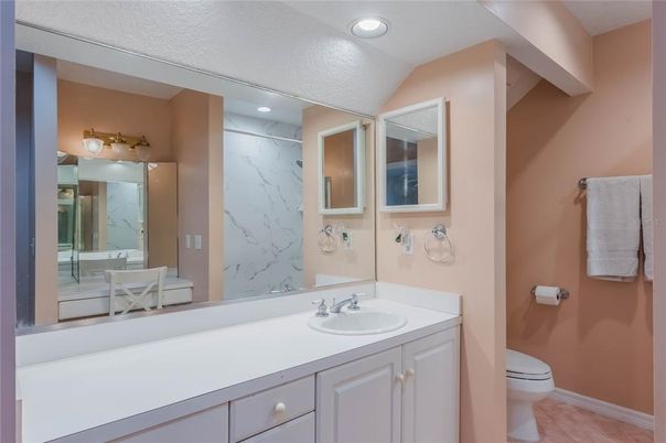 Bathroom, Dual Sink Vanities, Interior, Marble Walls, Recessed Lighting