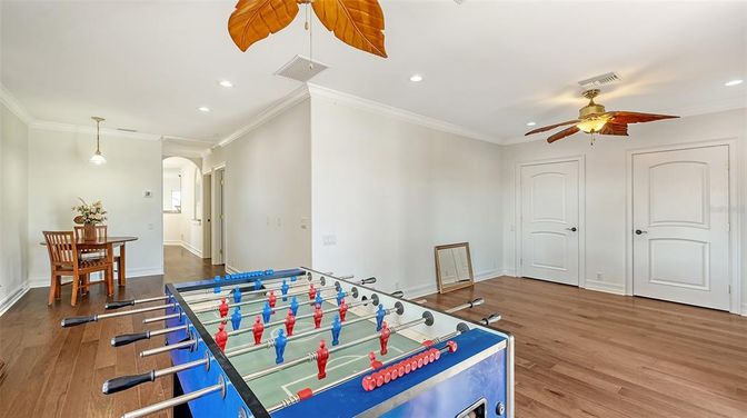 Dining room, Game Room, Interior, Pendant Lights, Recessed Lighting, Wood Texture Flooring