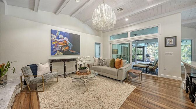 Chandelier, Fireplace, Interior, Living room, Recessed Lighting, Wood Texture Flooring