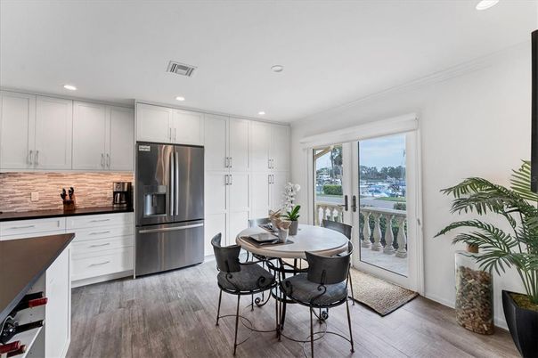 Dining room, Interior, Kitchen, Recessed Lighting, Stainless Steel Appliances, Wood Texture Flooring