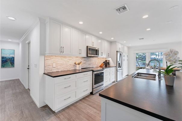 Interior, Kitchen, Recessed Lighting, Stainless Steel Appliances, Wood Texture Flooring