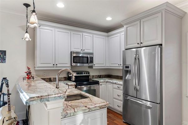 Interior, Kitchen, Pendant Lights, Recessed Lighting, Stainless Steel Appliances, Wood Texture Flooring