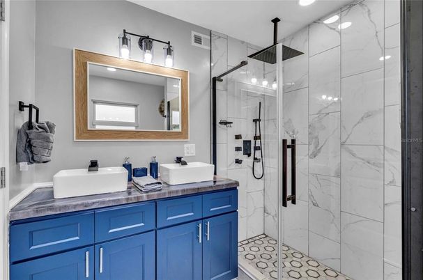 Bathroom, Dual Sink Vanities, Glass Shower, Interior, Marble Walls, Recessed Lighting