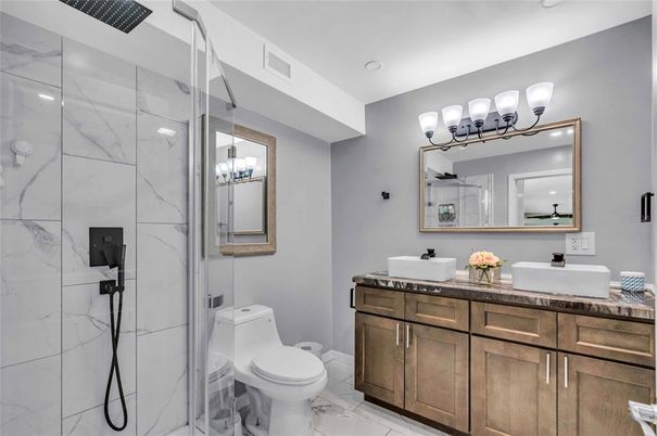 Bathroom, Dual Sink Vanities, Glass Shower, Interior, Marble, Marble Walls