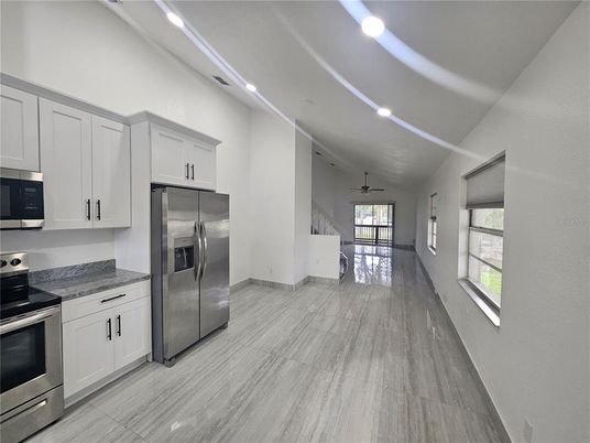 Interior, Kitchen, Recessed Lighting, Stainless Steel Appliances, Wood Texture Flooring