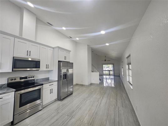 Interior, Kitchen, Recessed Lighting, Stainless Steel Appliances, Wood Texture Flooring