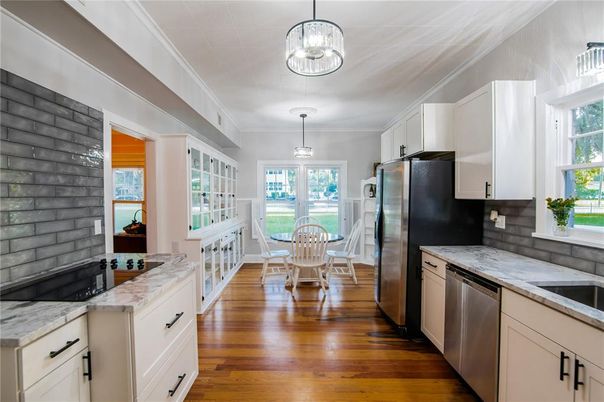 Dining room, Interior, Kitchen, Pendant Lights, Stainless Steel Appliances, Wood Texture Flooring