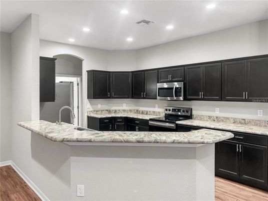 Interior, Kitchen, Recessed Lighting, Stainless Steel Appliances, Wood Texture Flooring