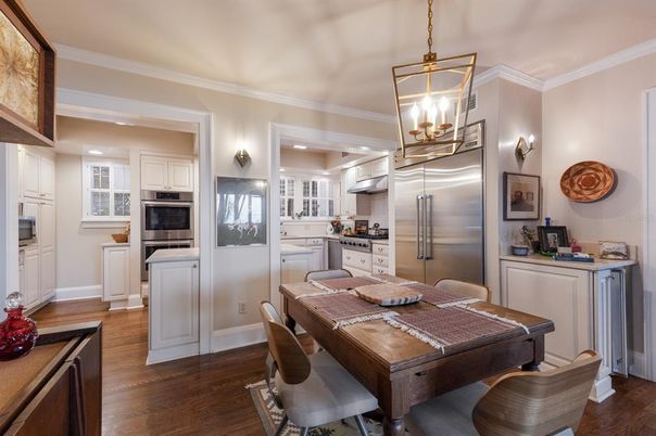 Dining room, Interior, Kitchen, Pendant Lights, Recessed Lighting, Stainless Steel Appliances, Wood Texture Flooring