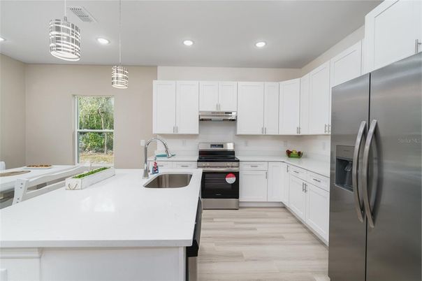 Interior, Kitchen, Pendant Lights, Recessed Lighting, Stainless Steel Appliances, Wood Texture Flooring