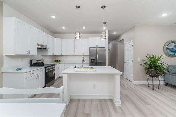 Interior, Kitchen, Pendant Lights, Recessed Lighting, Stainless Steel Appliances, Wood Texture Flooring