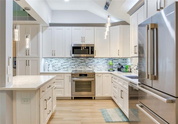 Interior, Kitchen, Pendant Lights, Recessed Lighting, Stainless Steel Appliances, Wood Texture Flooring