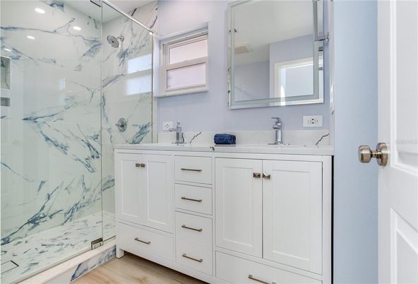 Bathroom, Glass Shower, Interior, Marble Walls, Recessed Lighting, Wood Texture Flooring