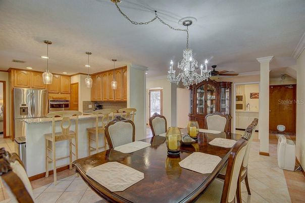Chandelier, Dining room, Interior, Kitchen, Pendant Lights, Recessed Lighting, Stainless Steel Appliances