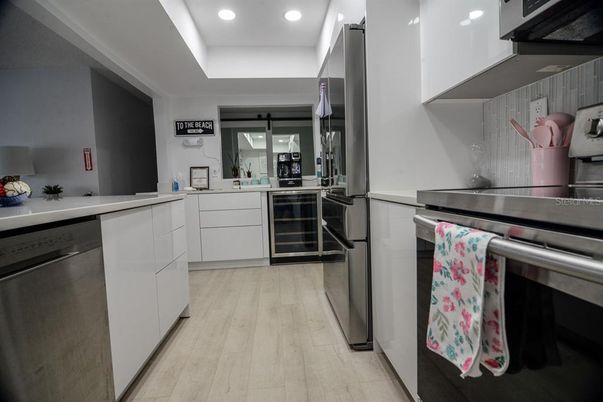 Interior, Kitchen, Recessed Lighting, Stainless Steel Appliances, Wood Texture Flooring