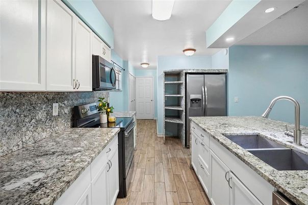 Interior, Kitchen, Recessed Lighting, Stainless Steel Appliances, Wood Texture Flooring