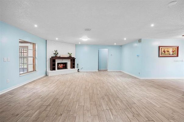 Empty room, Fireplace, Interior, Recessed Lighting, Wood Texture Flooring
