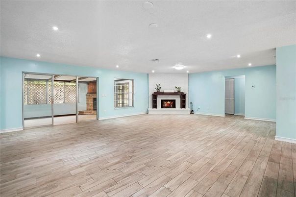 Empty room, Fireplace, Interior, Recessed Lighting, Wood Texture Flooring