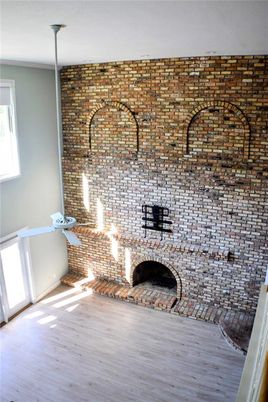 Empty room, Fireplace, Interior, Stone Walls, Wood Texture Flooring