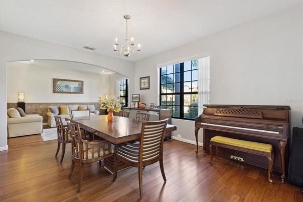 Chandelier, Dining room, Interior, Living room, Piano, Wood Texture Flooring