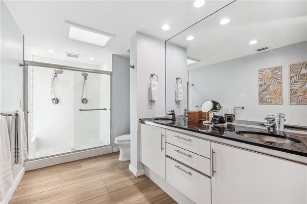 Bathroom, Dual Sink Vanities, Interior, Recessed Lighting, Wood Texture Flooring