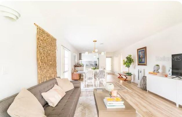 Dining room, Interior, Kitchen, Living room, Pendant Lights, Stainless Steel Appliances, Wood Texture Flooring