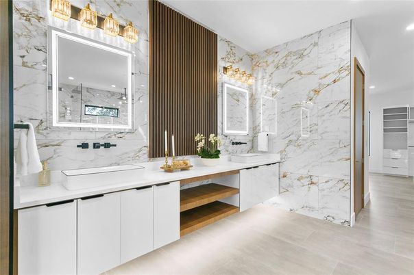 Bathroom, Dual Sink Vanities, Interior, Marble Walls, Recessed Lighting, Wood Texture Flooring