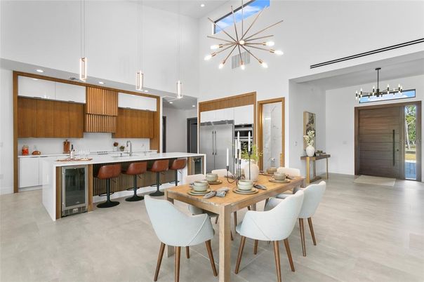 Dining room, Interior, Kitchen, Pendant Lights, Recessed Lighting, Stainless Steel Appliances, Wood Texture Flooring